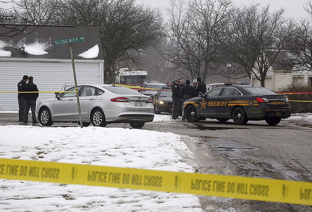 Two Westerville police officers were shot and killed Feb. 10 just before 1 p.m. in the 300 block of Crosswind Drive in Westerville.  (Tom Dodge / The Columbus Dispatch)