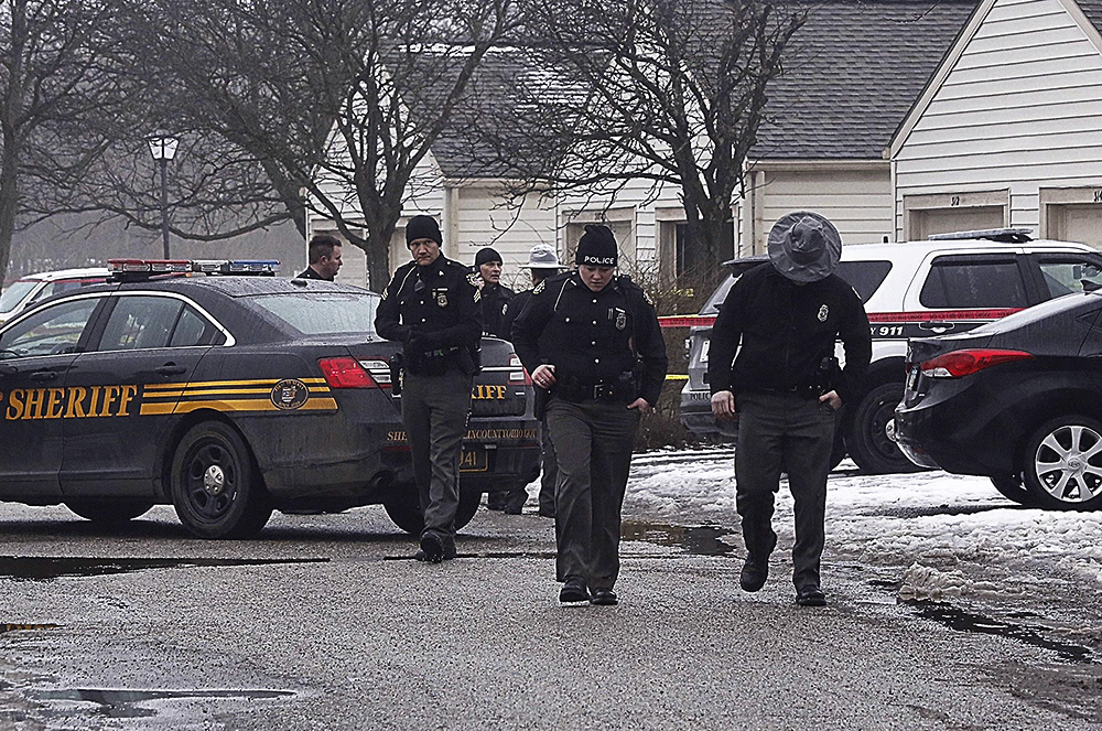 Two Westerville police officers were shot and killed February 10, just before 1 p.m. in the 300 block of Crosswind Drive in Westerville.  (Tom Dodge / The Columbus Dispatch)