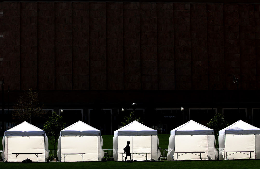 Feature - 2nd place - Tents are ready for vendors to set up in at the opening of Columbus Commons. (Fred Squillante / The Columbus Dispatch)
