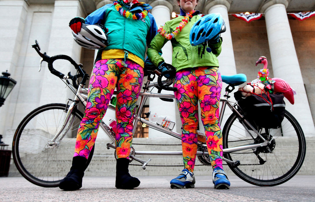 Portrait - 3rd place - Mark Buchwalder (left) and his daughter, Diane Buchwalder, show off their colorful leggings at the Ohio Statehouse before the start of the 50th Tour of the Scioto River Valley. (Fred Squillante / The Columbus Dispatch)