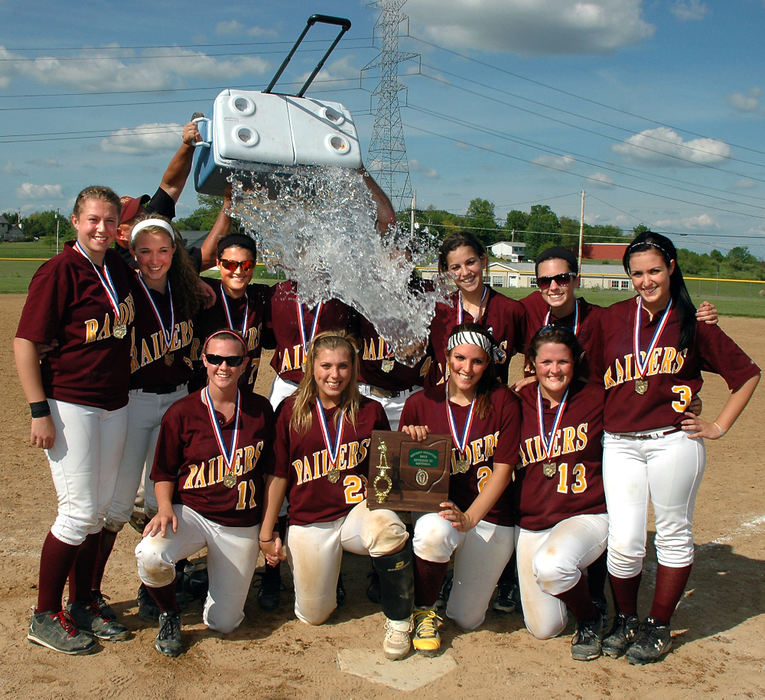 Sports - 1st place - South Range coaches Donee Feren and Frank Yanek had quite a surprise for the Raider softball team after it defeated Ursuline 10-1 in the Div. III district final at Dickey Field in Lisbon. (Patricia Shaeffer / The (Lisbon) Morning Journal)