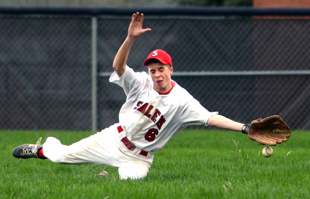 Sports - 3rd place - Salem outfielder Keaton O'Brien makes a diving catch attempt during a 3-1 win over Crestview. (Patricia Shaeffer / The (Lisbon) Morning Journal)