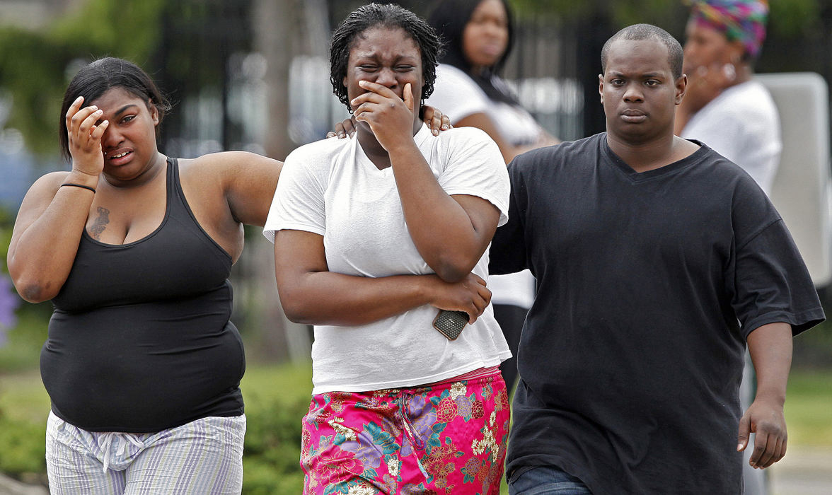 Spot News - 3rd placeThe mother one of the victims reacts after learning that she son was shot and killed in a double homicide near the Northland Arms complex north of Morse Road in Columbus. (Kyle Robertson / The Columbus Dispatch)