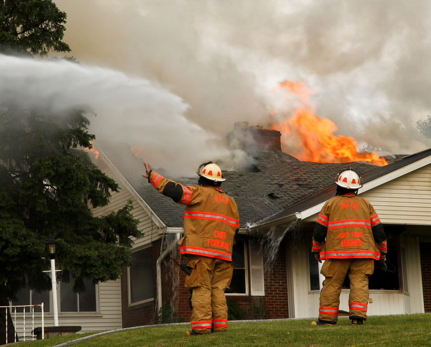 Spot News - 2nd placeFirefighters from Moorefield and German Townships battled a blaze at 42 Villa Road near OH-72. All five members of the Sellars family are safe as they were not home at the time the fire broke out around 6:45 p.m. (Barbara J. Perenic / Springfield News-Sun)