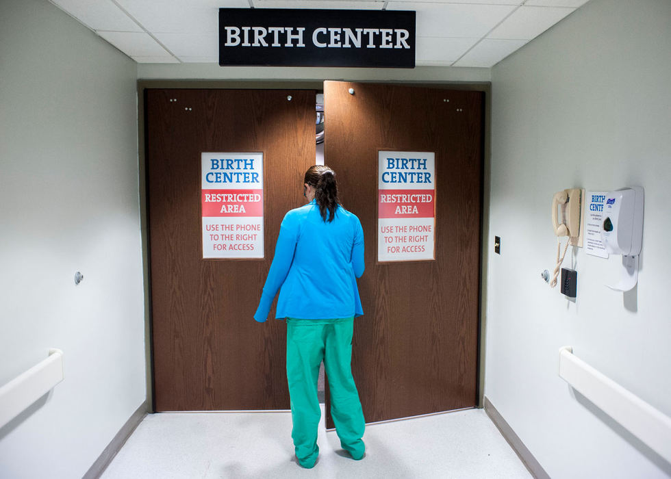 Story - 1st place - Dr. Sarah Gerlach enters the labor and delivery floor while on call. Residents are rotated to being on call every three days and must perform at their best ability at any given time of the night. (Logan Riely / The Columbus Dispatch)