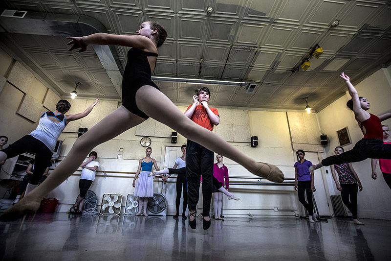 Feature - 1st place - Caitlin Federer rehearses with other Central Ohio Youth Ballet dancers for the spring performance, “Bravo 2015!” at Dennison University's Ace Morgan Theater. (Jessica Phelps / Newark Advocate)