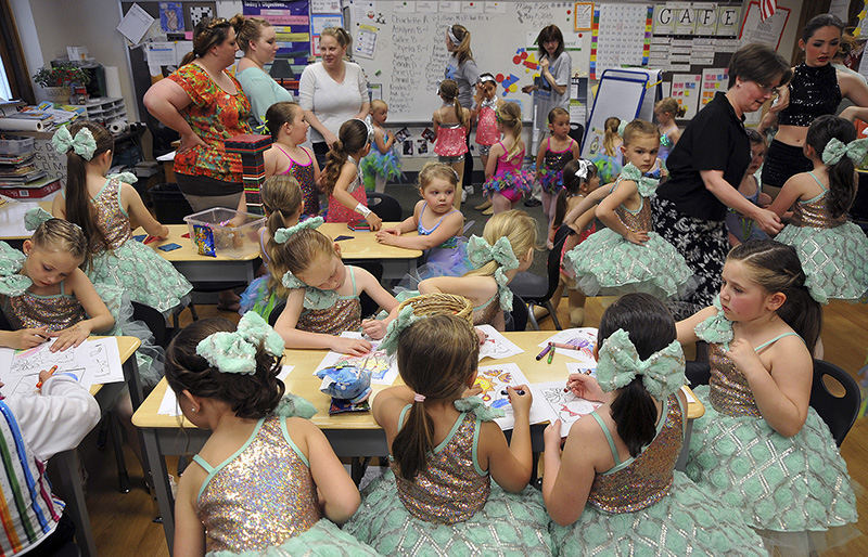 Feature - 3rd place - Future prima ballerinas get ready for their performance "Dancing in the Street" presented by the Eagle Dance Center at Bucyrus Elementary School. (Mitchell Pe Masilun / The (Mansfield) News Journal)
