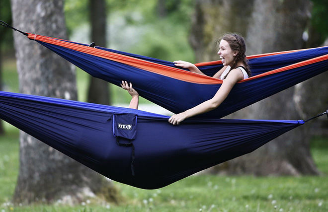 Feature - 3rd place - As if getting into the top hammock wasn't hard enough, Kira Keaslov (top) and Claire Kudika realize that their hammocks are too close together after both were inside their hammocks.  (Fred Squillante / The Columbus Dispatch)