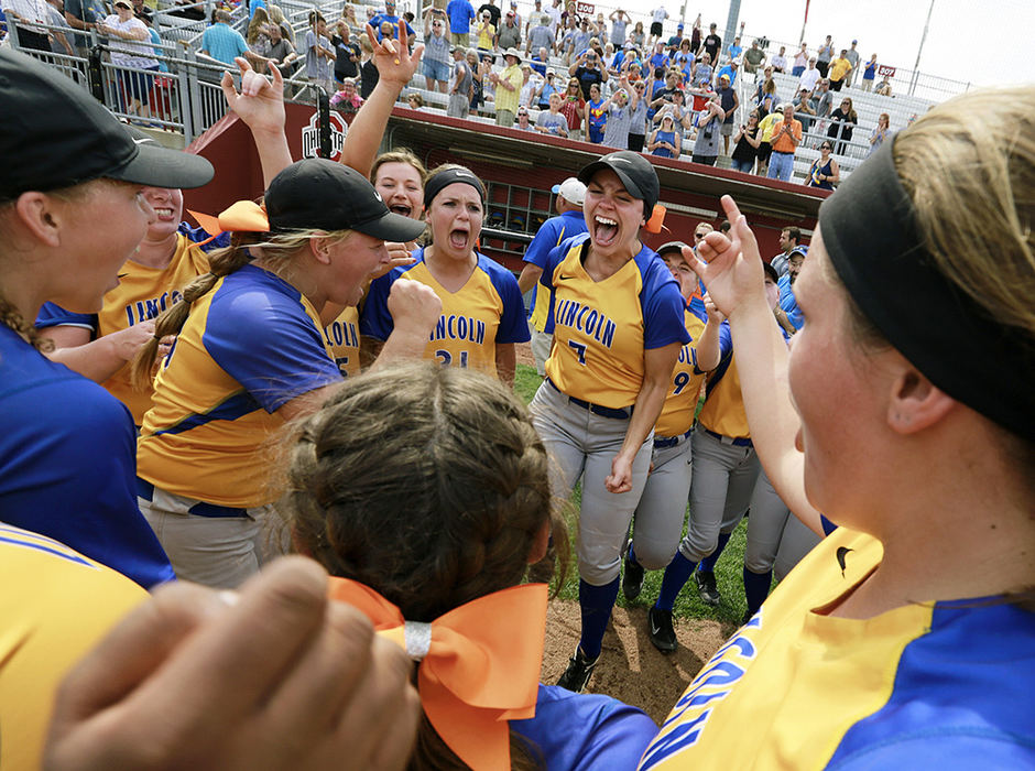 Sports Feature - 1st place - Gahanna Lincoln players celebrate a 6-2 win over Hilliard Bradley in a Division I regional final softball game at Ohio State University's Buckeye Field in Columbus. (Barbara J. Perenic / The Columbus Dispatch)