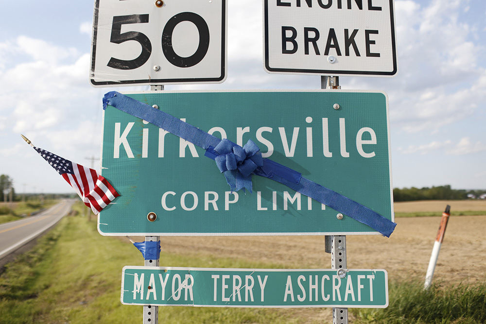 MTStory - HM - A blue ribbon adorns a sign in Kirkersville. The ribbon was placed in remembrance of the victims of the Kirkersville Shooting. (Joshua A. Bickel / The Columbus Dispatch)