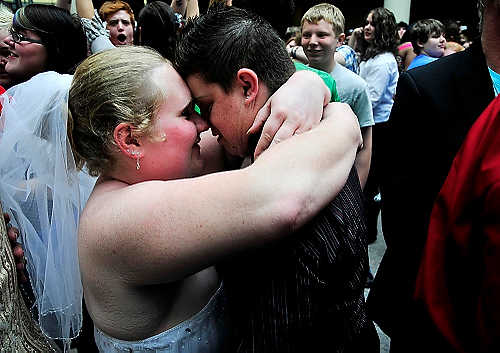 First place, Larry Fullerton Photojournalism Scholarship - Hannah Potes / Kent State UniversityAmanda Erb, 23, and her fiancé Mel Martin, 29, of Piqua, Oh, embraced after sharing wedding vows at a mock gay marriage ceremony in Cleveland. Erb and Martin had been together for five years before deciding to marry. 