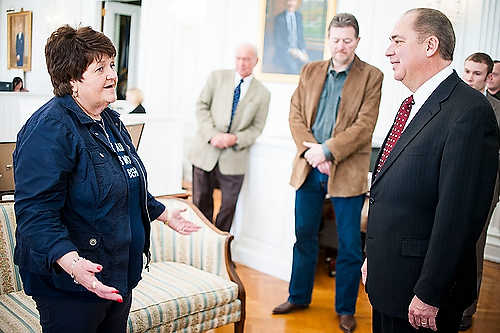 Second place, Larry Fullerton Photojournalism Scholarship - Steven Turville / Ohio UniversityKaren Gorrell speaks with West Virginia Governor Earl Ray Tomblin inside the state capitol in Charleston, West Virginia, on March 10, 2012. The retirees garnered support from many of the state's representatives, which proved to be invaluable as Century Aluminum began to seek state-granted energy subsidies in hopes of reopening their Ravenswood operations.