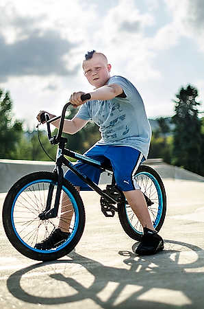 Second place, Larry Fullerton Photojournalism Scholarship - Steven Turville / Ohio UniversityMason Wileder, 11, of Athens, Ohio poses on his freestyle BMX bicycle at the Athens Skate Park . Wileder spends time in the park after school not only to bike, but to spend time with friends. When asked about his mohawk hairstyle, he simply responded, "My favorite color is blue."