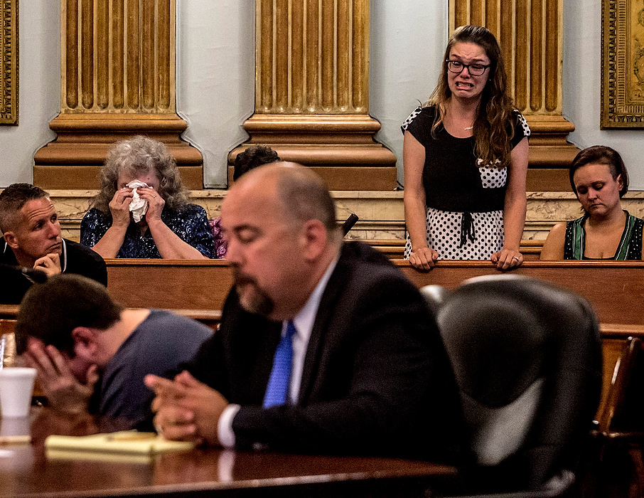First Place, Photographer of the Year - Small Market - Jessica Phelps / Newark AdvocateAdam Runyons' family reacts after he spoke at his hearing Monday afternoon. Runyons pleaded guilty to the murder of his father in May 2014. He received 18 years-life in prison for brutally killing his father with a machete. 