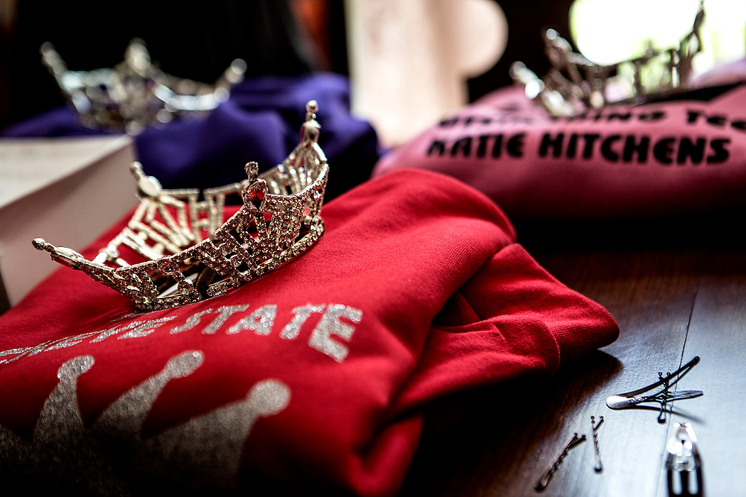 First Place, Photographer of the Year - Small Market - Jessica Phelps / Newark AdvocateTiaras sit on the dining room table from the Hitchens sisters local competitions where they won titles qualifying them to the State pageant Miss Ohio and Miss Ohio Outstanding Teen. 