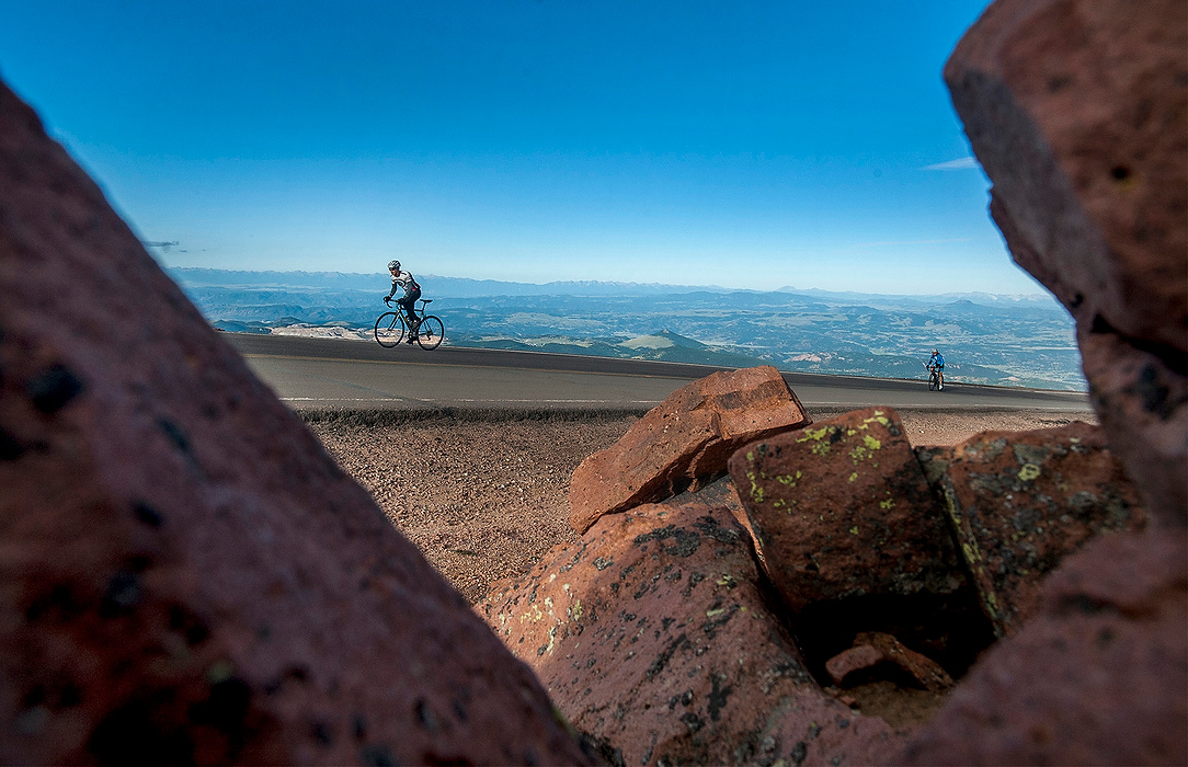 Second Place, Ron Kuntz Sports Photographer of the Year - Logan Riely / Ohio UniversityRiders from wave two race towards the finish line during the annual Broadmoor Pikes Peak Cycling Hill Climb held on the Pikes Peak Highway on Aug. 9, 2015. Approximately 200 riders, of all ages, rode 12.42 miles up to the 14,115 foot summit. 