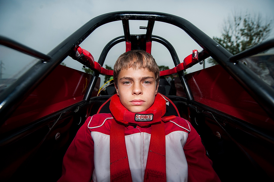 Second Place, Ron Kuntz Sports Photographer of the Year - Logan Riely / Ohio UniversityAndrew Schmidt, 12, of Morrison, Illinois, sits in his dragster prior to racing in the 62nd annual World Series of Drag Racing event held at the Cordova International Dragway held on Aug. 28, 2015, in Cordova, Illinois. Schmidt began racing last year after watching his father and grandfather race for years.
