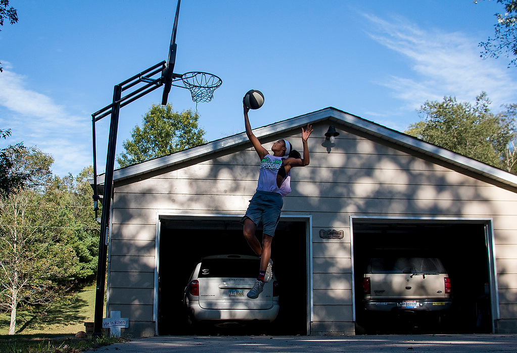 Second Place, Ron Kuntz Sports Photographer of the Year - Logan Riely / Ohio UniversityPracticing in her driveway is sometimes the only chance Jensen has to practice throughout the week due to playing high school volleyball, which is now in season. “The gym I normally go to is 45 min. away so when I do have time to go, I will stay usually 3 hours to lift, condition and train all on my own,” she said.