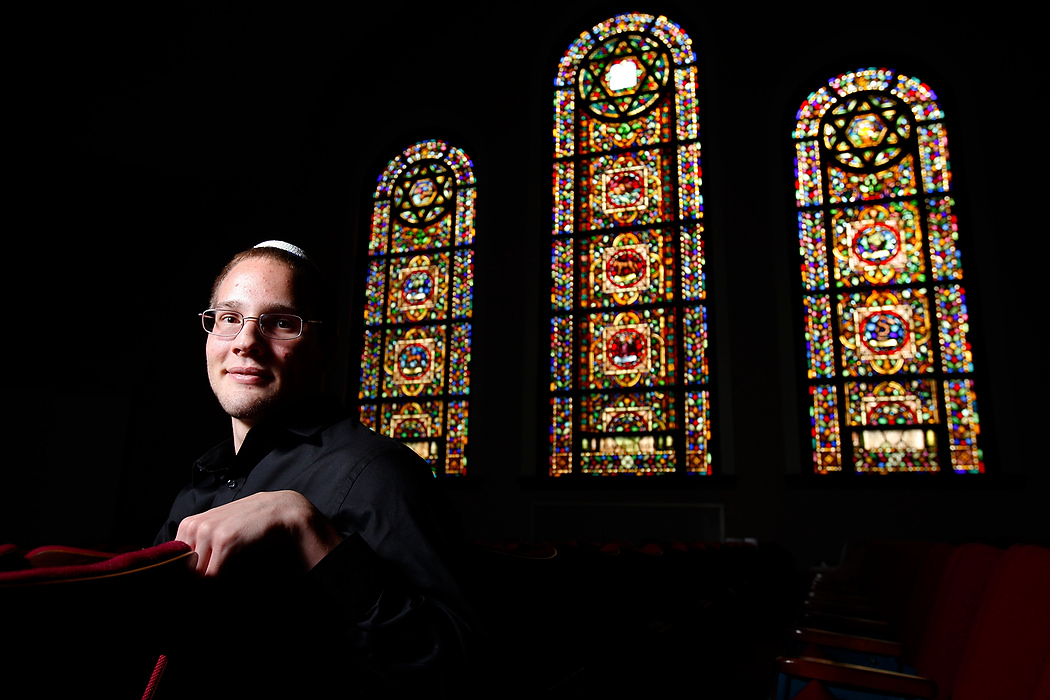 , Student Photographer of the Year - Eli C. Hiller / Ohio UniversityAustin Reid, 19, of Lancaster, Ohio and a student studying political science at Capital University, sits in the pews at the Tifereth Israel synagogue on 1354 E Broad St. in Columbus, Ohio on May 29, 2015. Reid recently converted to Judaism after being baptized Lutheran and growing up Catholic. Reid strives to build a jewish community in his hometown and at Capital University. 