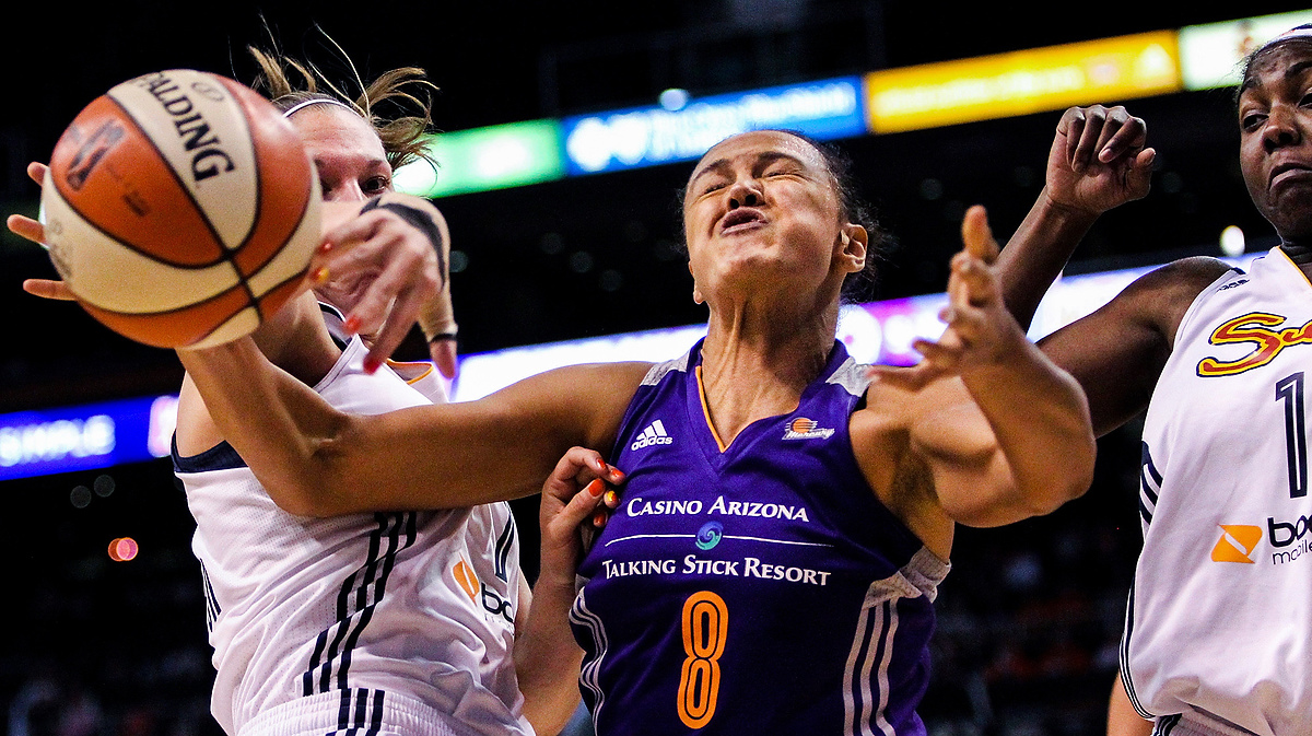 First Place, Student Photographer of the Year - Isaac Hale / Ohio UniversityMercury Forward Mistie Bass takes contact from Sun's players as she goes up for a shot. The Connecticut Sun defated the Phoenix Mercury 90-78 in double overtime at the US Airways Center in Phoenix, AZ, on Friday, June 19, 2015.
