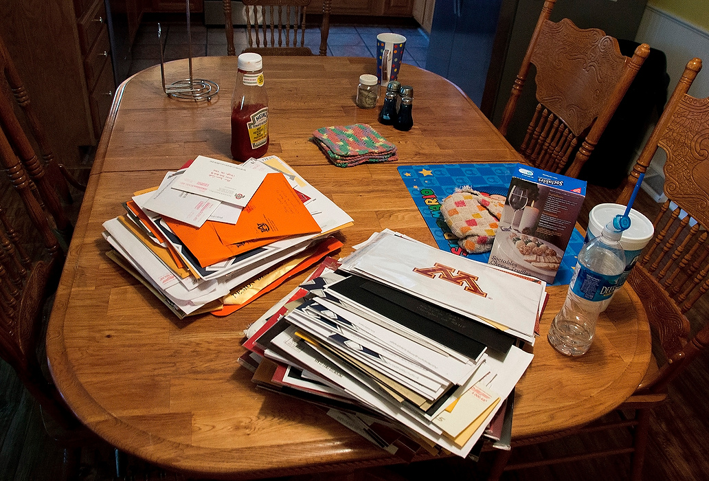 First Place, Sports Picture Story - Logan Riely / Ohio UniversityUnopened recruiting letters from colleges across the country lay on the kitchen table waiting to be looked at. “I just don’t have enough time to open them,” Jensen said, “and they keep coming more and more every day.”