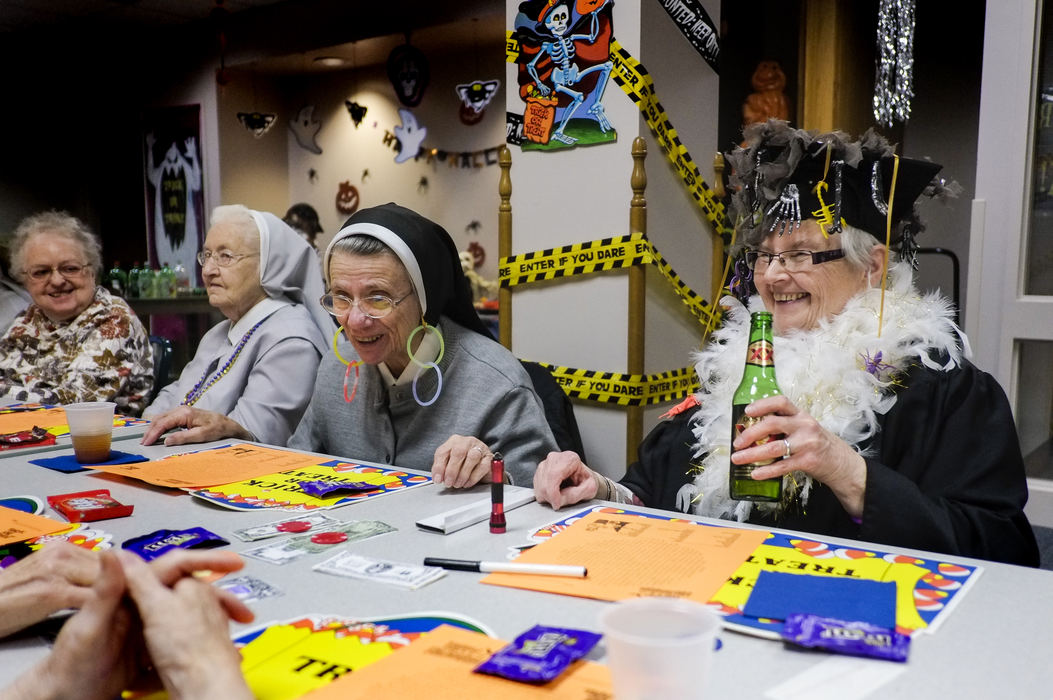 Award of Excellence, Feature  - Andy Morrison / The (Toledo) BladeEnjoying a Halloween party are (from left) Sr. Mary Mara Bennett, Sr. Mary Jamesetta Krafty, Sr. Mary Bryan Gabel, and Sr. Mary Sartor, at the Provincial Center.