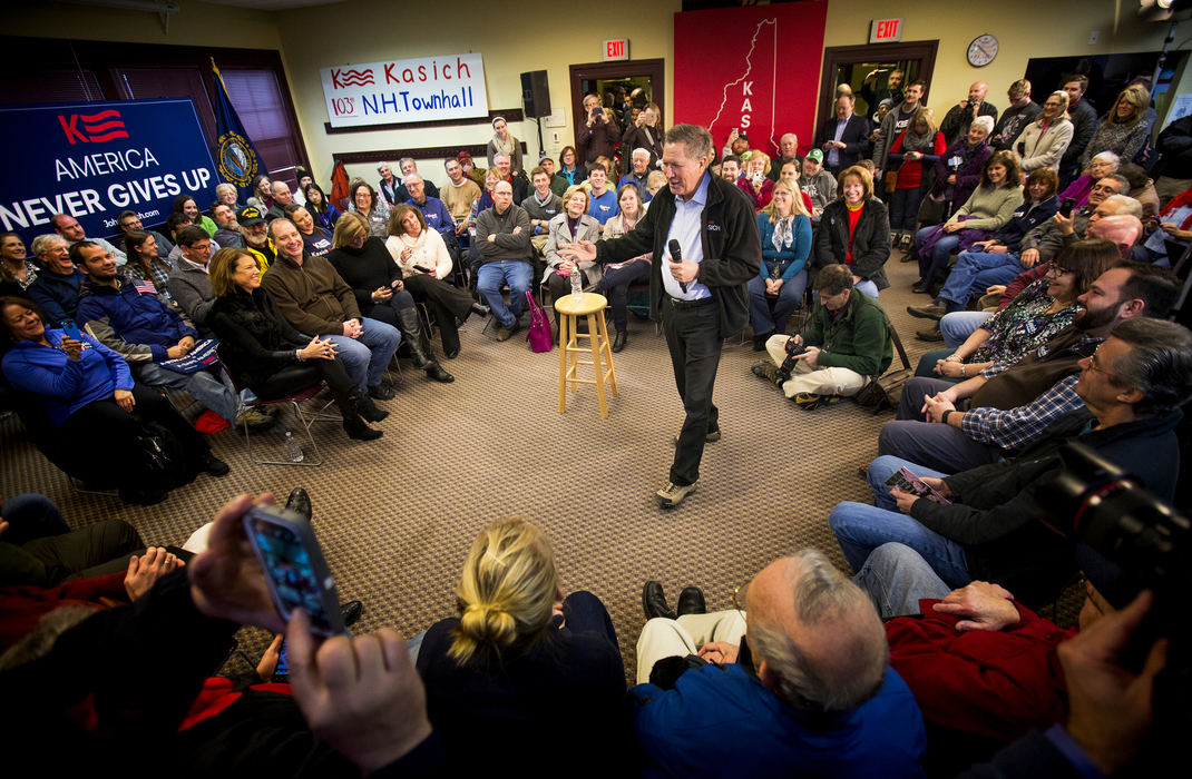 Award of Excellence, Feature Picture Story - Meg Vogel / Cincinnati EnquirerGov. John Kasich answers questions at his 103rd town hall at Plaistow Public Library in Plaistow, N.H. on Monday, Feb. 8, 2016. “If I win, great. If I don’t win, I’m going to join another crusade. Because I’m not going to stop crusading until the day I die,” Kasich said.