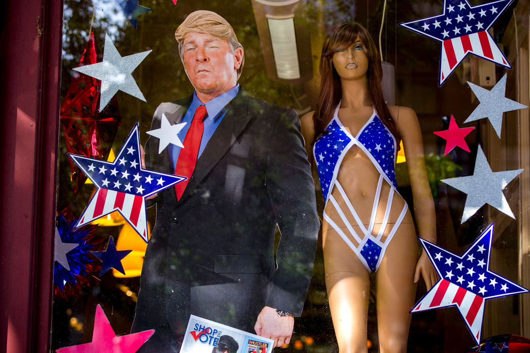 Award of Excellence, News Picture Story - Meg Vogel / Cincinnati EnquirerA Trump cutout stands next to a mannequin at Adultmart in Cleveland, Ohio Monday, July 18, 2016. 