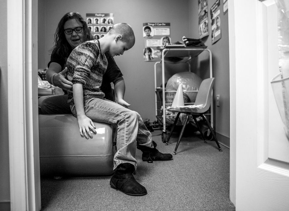 First Place, Ohio Understanding Award - Jessica Phelps / Newark AdvocateOccupational Therapist, Julie Endly, works with Phoenix during her weekly session. The weekly therapy sessions have helped Phoenix greatly, according to her mom. 