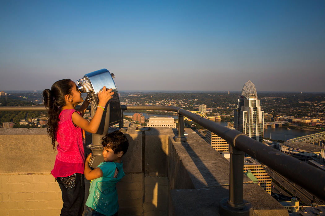 Second Place, James R. Gordon Ohio Understanding Award - Meg Vogel / Cincinnati EnquirerZina and Ghalia Alhamoud looks at downtown Cincinnati from the top of Carew Tower on Sunday, September 25, 2016. Marie said, "The best thing in my life is watching my kids study and learn."