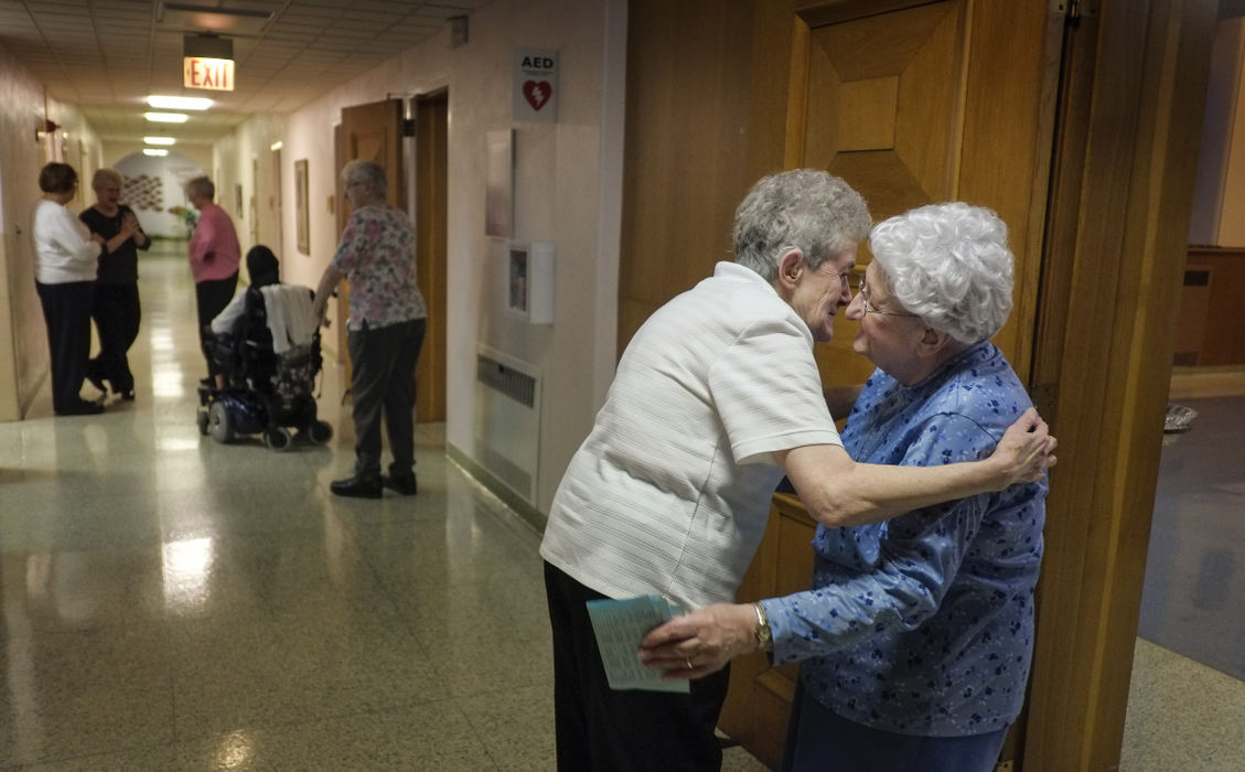 Third Place, Ohio Understanding Award - Andy Morrison / The (Toledo) BladeSr. Brigid Kelly and Sr. Agnes Rose Tscherne, right, hug following the final mass at the Sisters of Notre Dame Toledo Provincial Center.