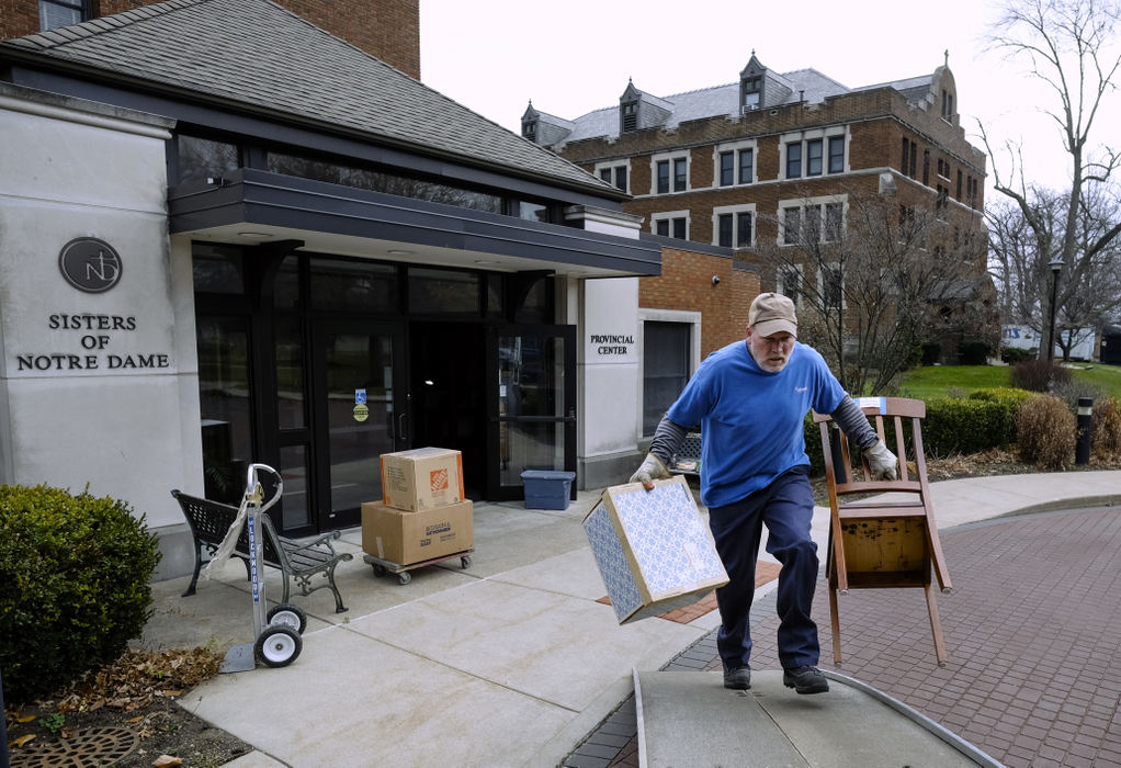 Third Place, Ohio Understanding Award - Andy Morrison / The (Toledo) BladeJeff Collins of Stevens Worldwide Van Lines moves items out of the Sisters of Notre Dame Toledo Provincial Center, Tuesday.