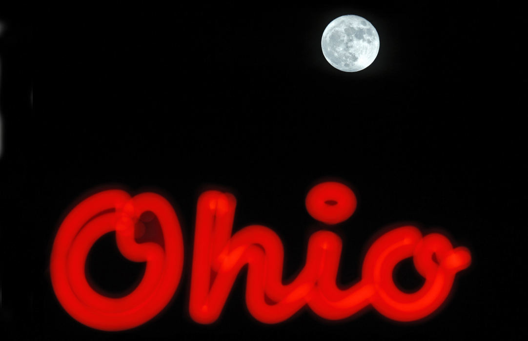 Award of Excellence, Pictorial - Eric Albrecht / The Columbus DispatchThe super moon crests over the marquee of the Ohio Theater seemly dotting the I.