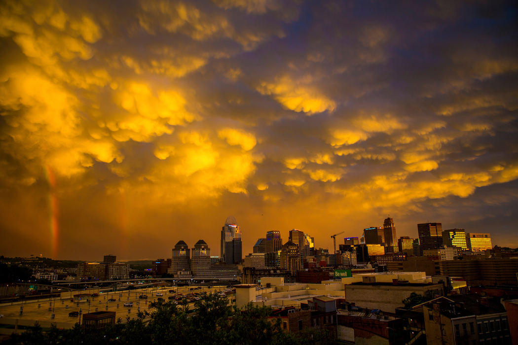 First Place, Photographer of the Year - Large Market -  / The Enquirer/Meg VogelA double rainbow appears after a thunderstorm in downtown Cincinnati Wednesday, June 15, 2016.