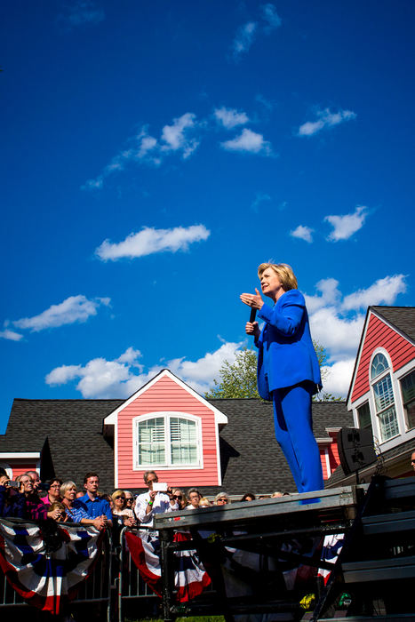First Place, Photographer of the Year - Large Market - The Cincinnati Enquirer / The Enquirer/Meg VogelHillary Clinton speaks to a crowd of several hundred people in the front yard of Kentucky Democrat Nathan Smith in Fort Mitchell, Ky. Sunday, May 15, 2016, two days before Kentucky's primary. "I want you to imagine what it would be like to be secretary of state for a president who says no Muslims can come to our country," Clinton said. "We're trying to end or prevent a war. What you hear from Donald Trump is not just offensive. It is dangerous."