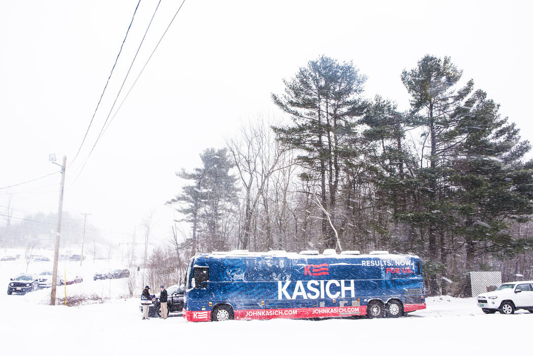 First Place, Photographer of the Year - Large Market -  / The Enquirer/Meg VogelGov. Kasich's bus parks in the snow outside his town hall at Seamless School and Chapel in Windham, N.H. on Monday, Feb. 8, 2016.