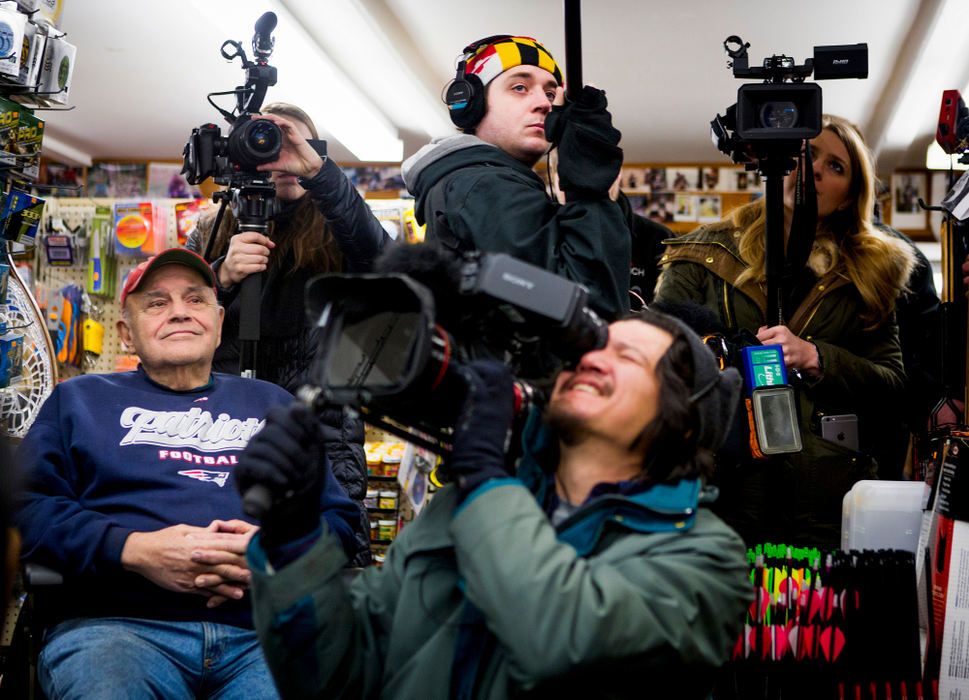 First Place, Photographer of the Year - Large Market - Meg Vogel / The Enquirer/Meg VogelA man listens to Gov. John Kasich talk to the owner of Walt Morse Sporting Good Store, during a visit in Hillsboro, N.H. Tuesday, January 19, 2016. As Gov. Kasich did better in the polls, more national media outlets began to follow him, including documentary crews from Showtime and Huffington Post.