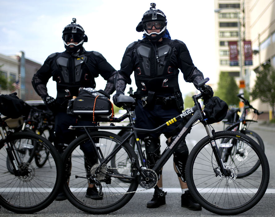 Second Place, Photographer of the Year - Large Market - Kyle Robertson / The Columbus Dispatch The Cleveland Police Department officers use bikes to set the perimeter of the crowds during The Shut Down Trump and The RNC March and Rally that started on E. 36th St. and Euclid Ave. and proceeded into downtown Cleveland on July 17, 2016.  