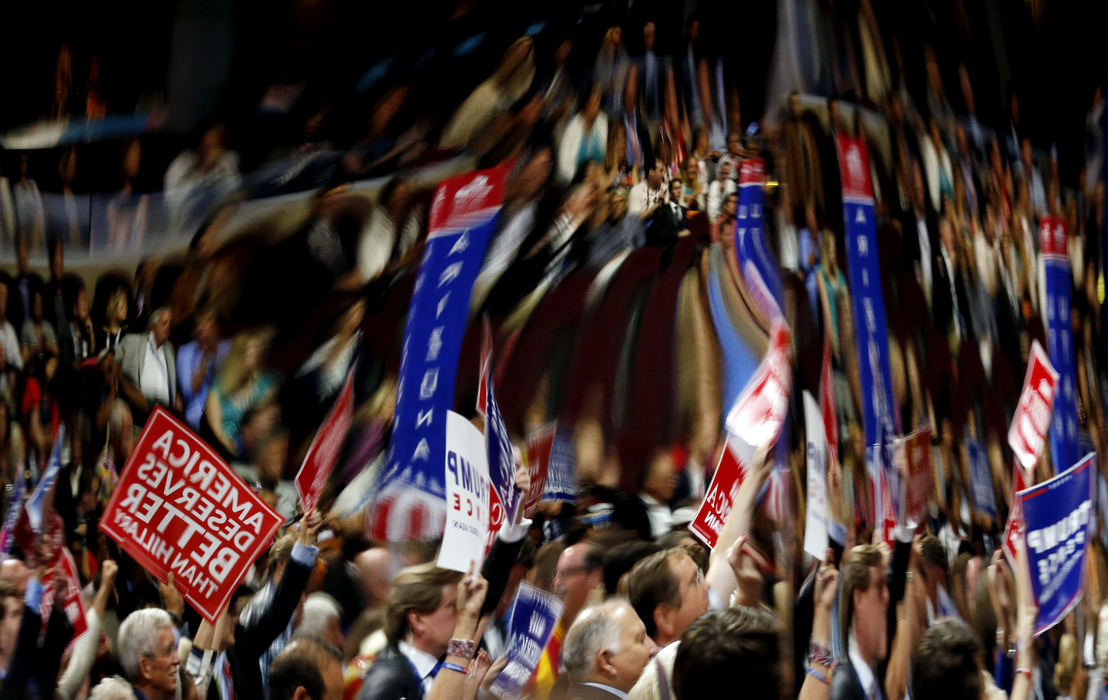 Second Place, Photographer of the Year - Large Market - Kyle Robertson / The Columbus Dispatch Delegates cheer as Donald Trump and Mike Pence take the stage after Pence accepted the Vice Presidential Nomination during the third day of the Republican National Convention at Quicken Loans Arena in Cleveland on July 20, 2016. 
