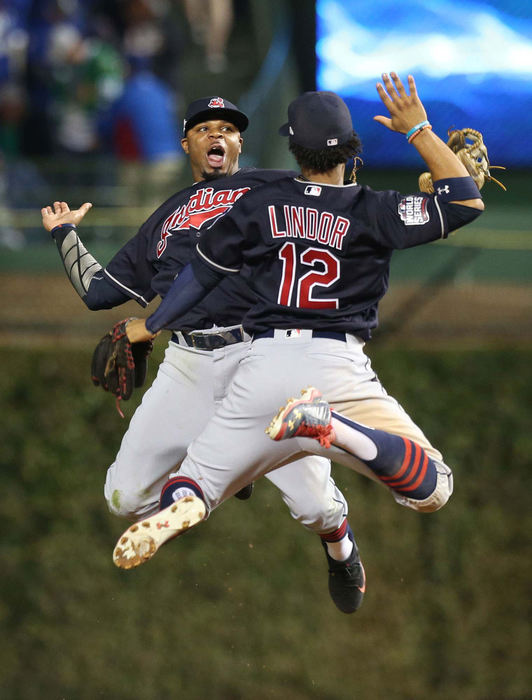 Award of Excellence, Sports Feature - Chuck Crow / The Plain DealerCleveland Indians Rajai Davis and Francisco Lindor celebrate the 7-2 victory over the Chicago Cubs in Game 4 of the World Series at Wrigley Field.
