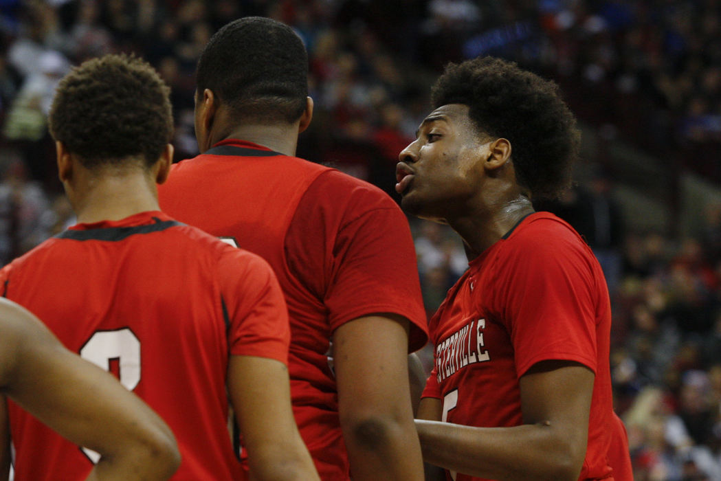 Second Place, Ron Kuntz Sports Photographer of the Year - Joshua A. Bickel / ThisWeek Community NewsWesterville South forward Andre Wesson, right, tries to calm down his brother, Westerville South center Kaleb Wesson, center, after he took a hard foul during the first half of the OHSAA Division I boys basketball state championship between the Westerville South Wildcats and the Lima Senior Spartans on Saturday, Mar. 19, 2016 at Value City Arena in Columbus, Ohio.