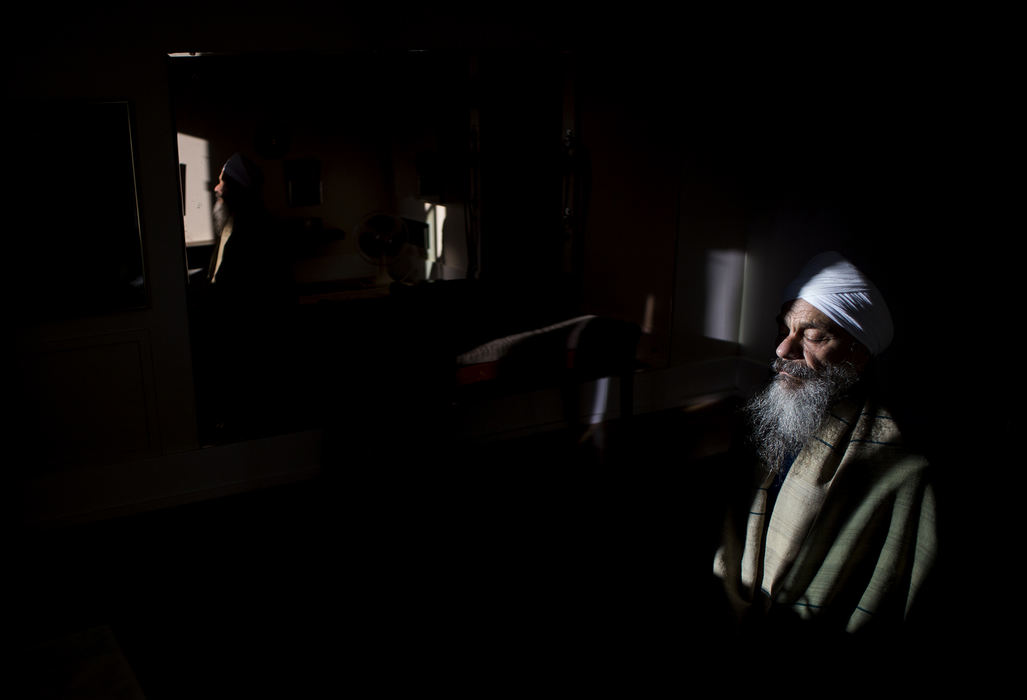 Second Place, Chuck Scott Student Photographer of the Year - Eslah Attar / Kent State UniversitySubagh Singh Khalsa meditates in his Chautauquan house as part of his morning routine August 23, 2016. Khalsa leads the Mystic Heart Meditation Program, where he provides opportunities for Chautauquans to gather and center themselves through meditation, contemplation and other universal techniques of religious and wisdom traditions. 