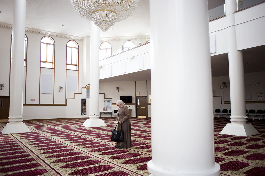 Second Place, Chuck Scott Student Photographer of the Year - Eslah Attar / Kent State UniversityMariam visits the Islamic Center of Cleveland for the first time since she arrived in the States on Monday, Dec. 5, 2016. Mariam and her family are from a town in Syria called Umm Walad about 80 miles south from Damascus.  Because of the worsening conditions, they fled from Syria leaving everything behind except a few suitcases with clothes, and found refuge in Jordan for a few years before coming to America in July of 2016. "I'm really happy to see a mosque like this because in these four to five months, I haven’t seen a mosque this beautiful," Mariam said.