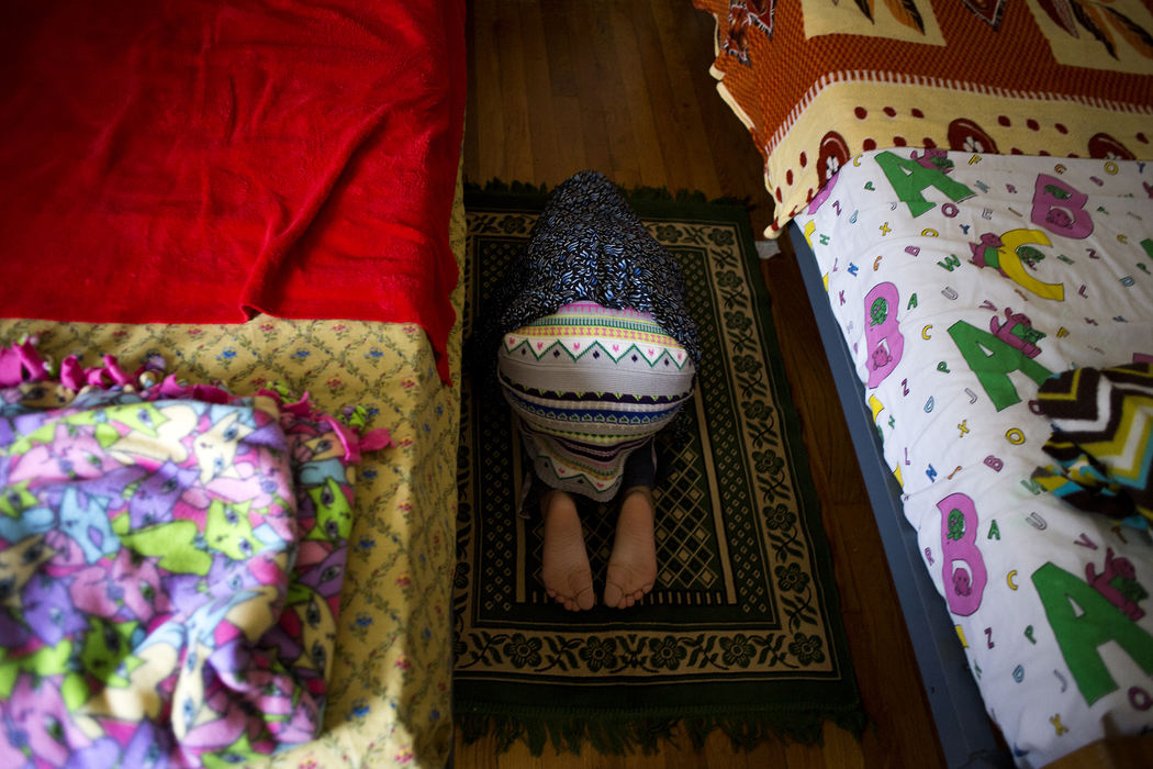 Second Place, Chuck Scott Student Photographer of the Year - Eslah Attar / Kent State UniversityBaisan performs one of the five daily prayers throughout the day after coming home from school.