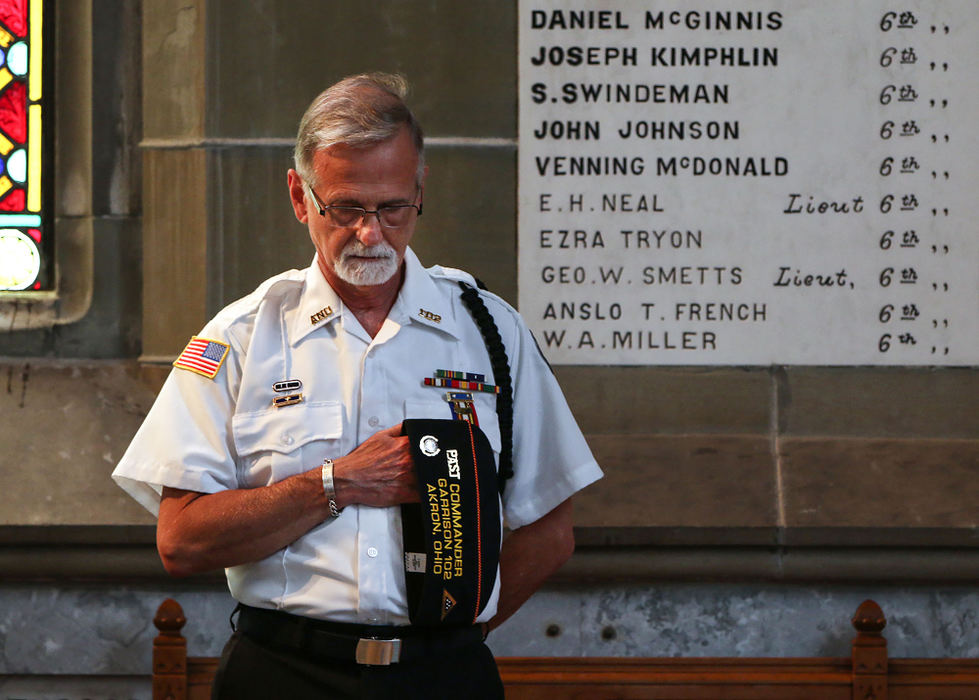 First Place, Chuck Scott Student Photographer of the Year - Andrea Noall / Kent State UniversityJerry Steffek, of Akron, holds his hat to his heart as he prays during a memorial service for veterans at the Civil War Memorial Chapel at the Glendale Cemetery in Akron on Sunday, May 29, 2016. 