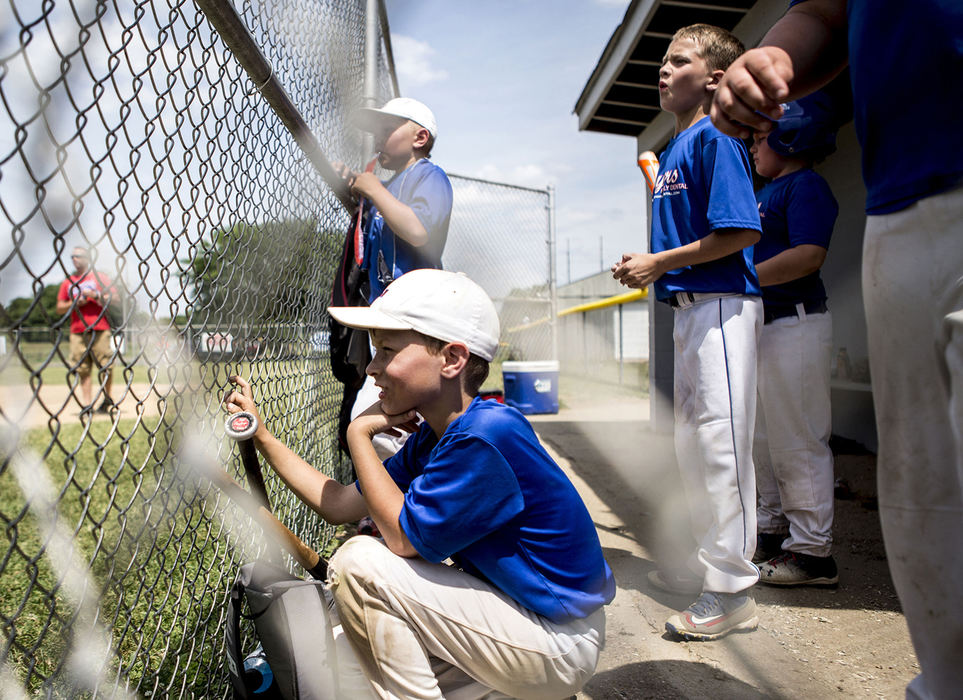First Place, Sports Picture Story - Jessica Phelps / Newark AdvocateMeyers Dental players watch their quarterfinal game against Pappy's Grill. Teams throughout Licking County gathered at Mound City baseball fields Saturday to play in the Shrine Tournament quarter finals. 