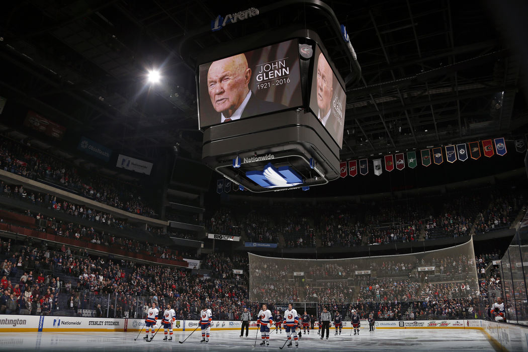 Award of Excellence, Team Picture Story - Kyle Robertson / The Columbus DispatchThe Columbus Blue Jackets NHL hockey team pays tribute to John Glenn before their game against New York Islanders at Nationwide Arena in Columbus, Ohio on December 10, 2016.  