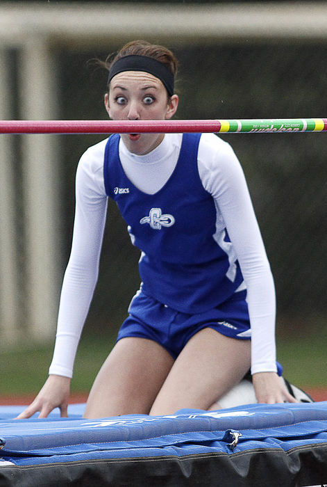 Sports - 1st place - Central Crossing high jumper Kendal Witherup steadies the bar with her eyes after clearing 4-foot 6-inches during the track meet at Worthington Kilbourne. (Adam Cairns / ThisWeek Newspapers)