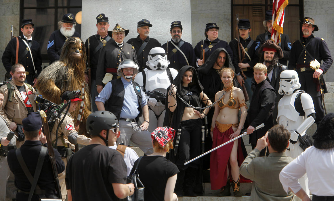 Story - 3rd place - Civil War reenactors are joined by culture reanactors who got into the fun at the Ohio Statehouse lawn to mark the 150th anniversary of the Civil War. (Jeff Hinckley / The Columbus Dispatch)