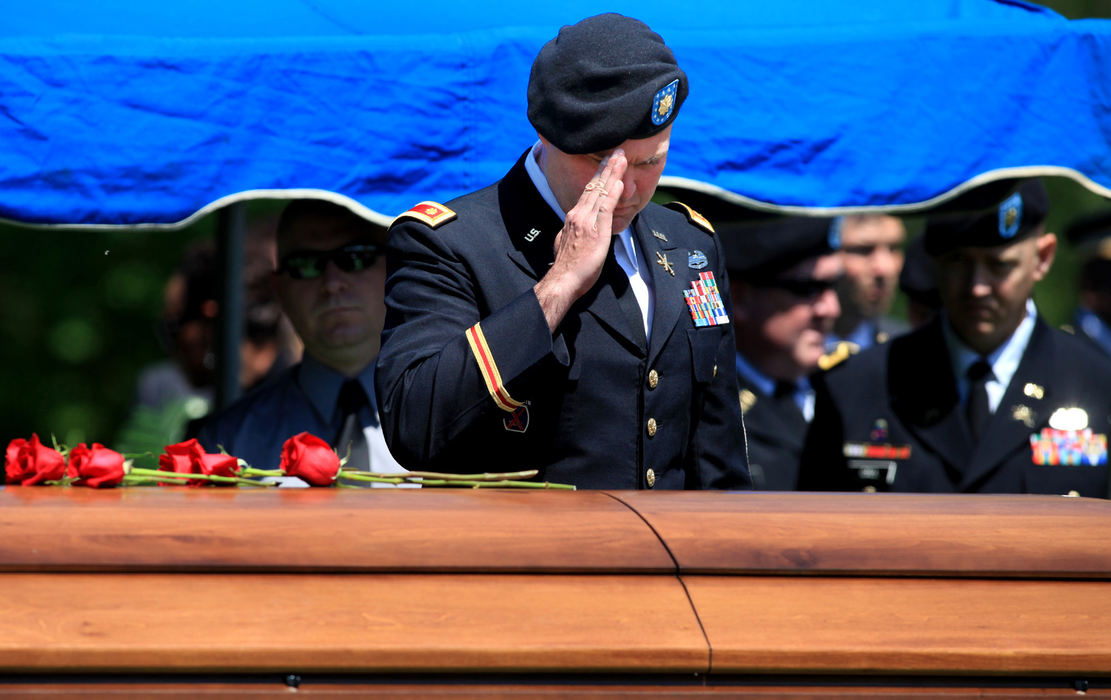 General News - 3rd placeA final salute for Ohio National Guard Captain Nicholas Rozanski at Dublin Cemetery. (Fred Squillante / The Columbus Dispatch)